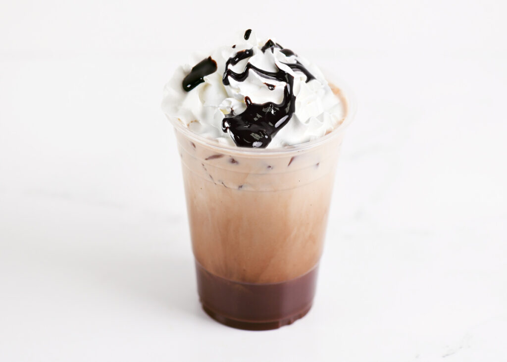 A Mocha coffee drink in a plastic cup.